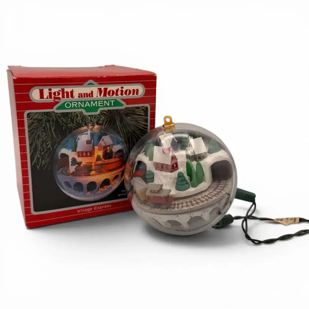 1986 Hallmark Keepsake Light and Motion Village Express Ornament